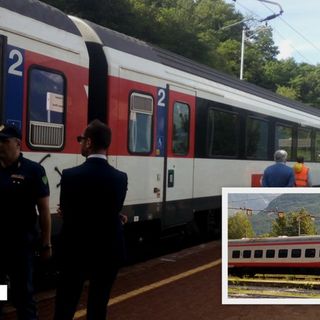 Foto: l'Intercity appena fatto entrare inb stazione a Preglia e nel riquadro il locomotore che venne parcheggiato allo scalo di Domo 1