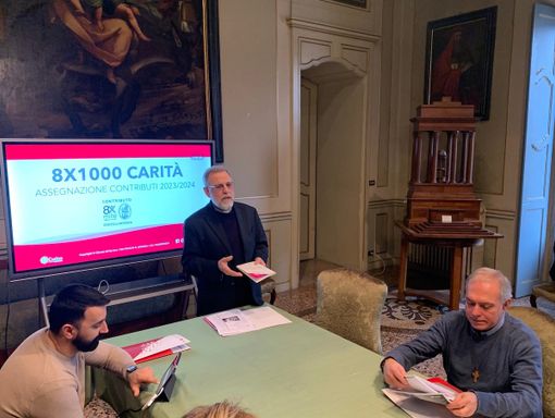 Da sinistra Federico Diotti, mons. Fausto Cossalter, don Giorgio Borroni