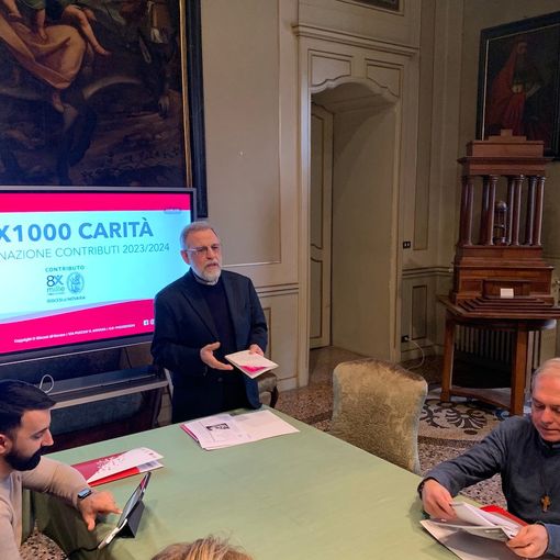 Da sinistra Federico Diotti, mons. Fausto Cossalter, don Giorgio Borroni