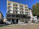 Un condominio di sei piani con “giardino verticale” al posto del Miralago