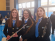 Tre ragazze della Nuova Filarmonica Omegnese al concerto regionale di Anbima