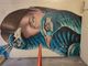 Street art contro i vandalismi al parcheggio Rosmini di Intra