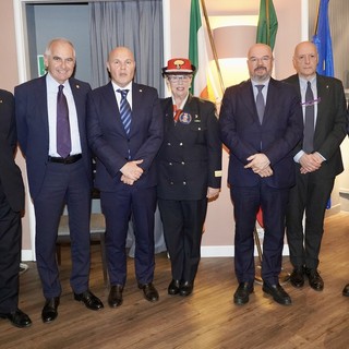 In foto da sx: maggiore Rondano, Nobili, presidente Club Macaluso, Cav. Tagliacollo (ONAOMAC), senatore Borghi, Corti e maggiore Recupero